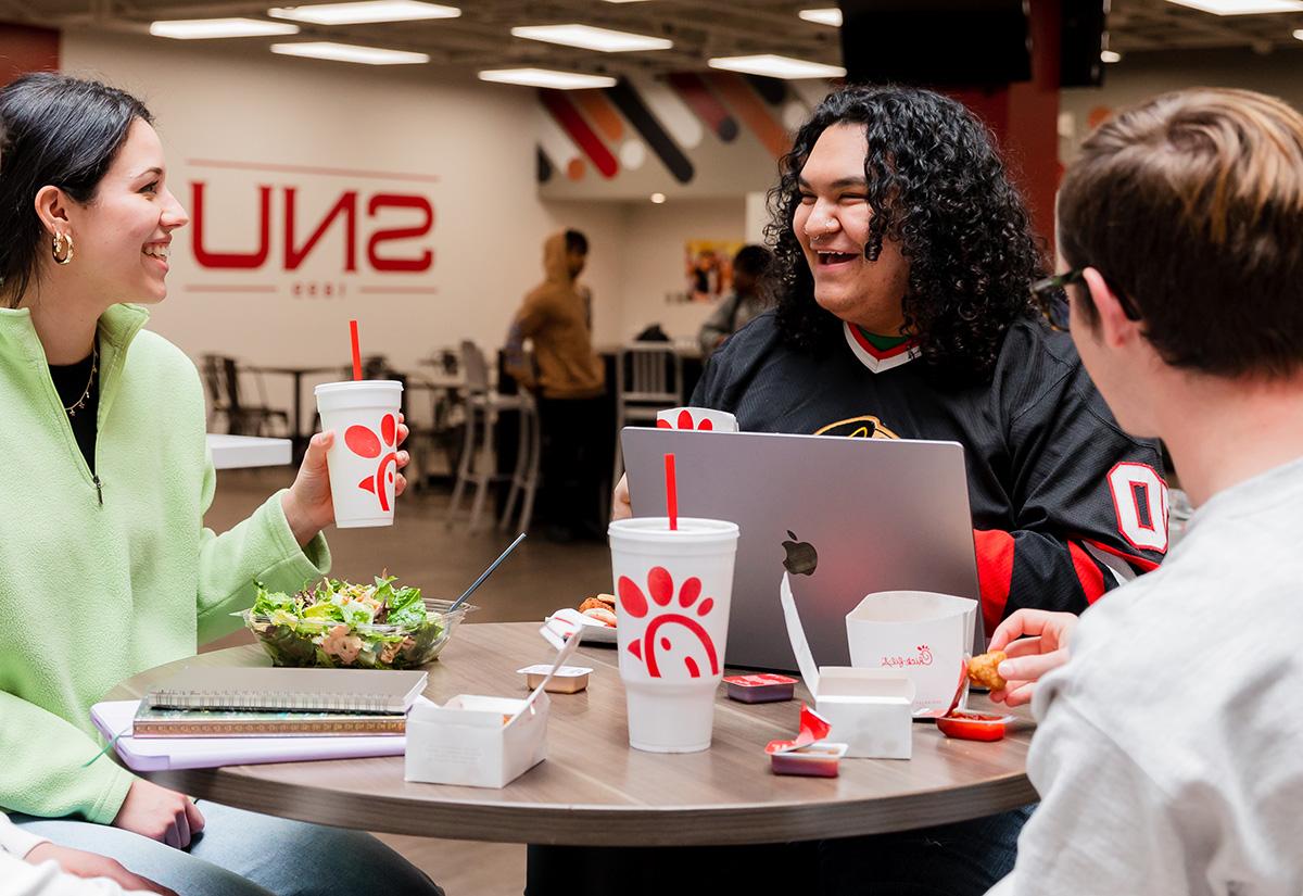 students eating chick fil a